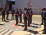 Soldado Pavão ao centro participa de solenidade de recebimento do braçal da ROCAM