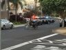 Policiais deixando o Damha II e  no detalhe o casal de advogados