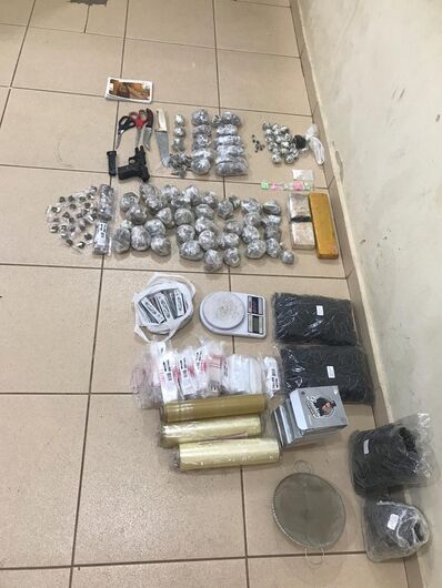 Casal é detido com arma e entorpecentes no Santa Felícia - Crédito: Divulgação